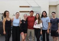 Students posing for photo at gym