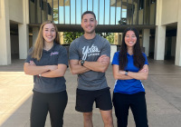 Students posing in front of Adams Humanity