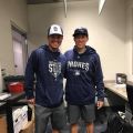 Student taking picture with padres player