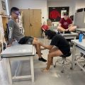 Student measuring leg length