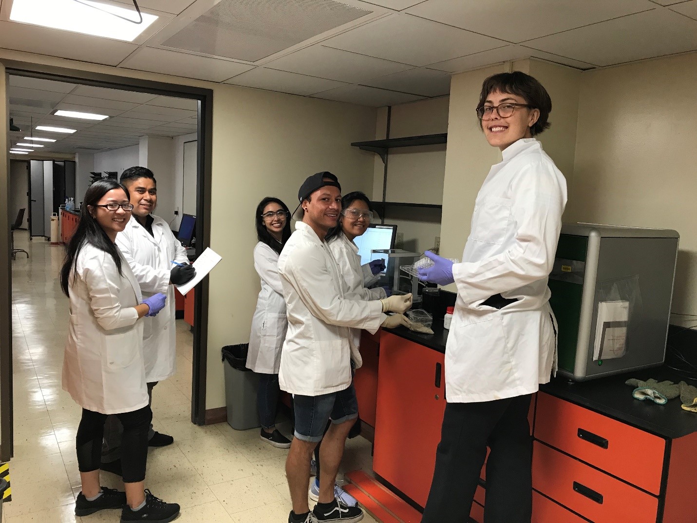 Student Researchers posing in their lab